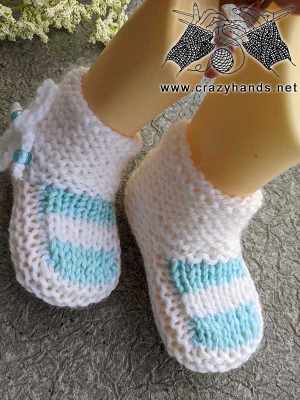 newborn baby knit striped booties - close-up view