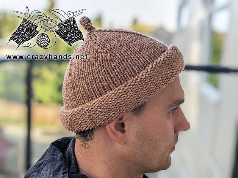 knit bus driver hat on male model - right-side view