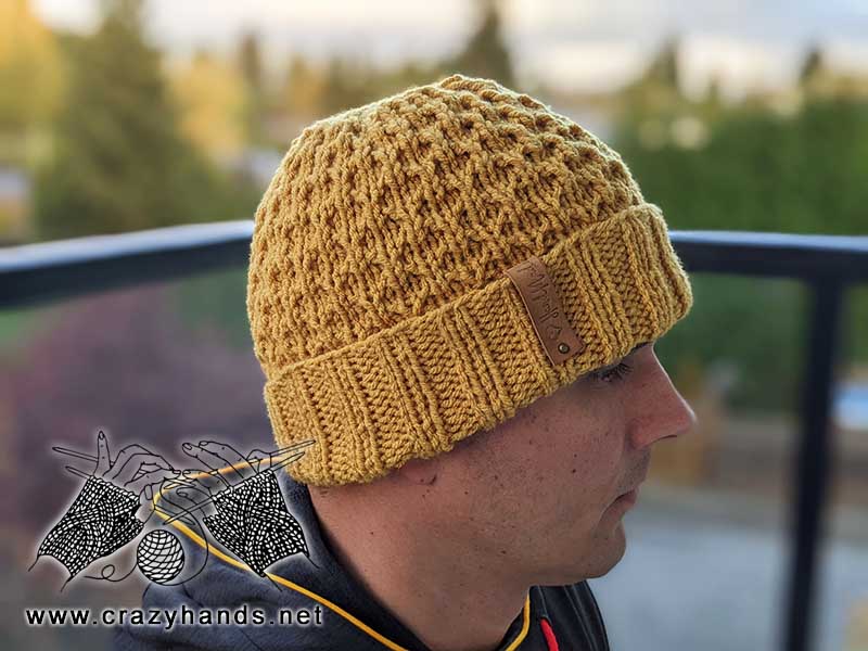 quick and cozy knit hat on a male model - right side view
