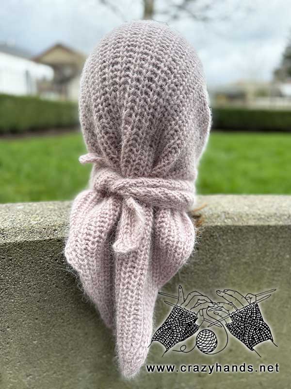 knit baktus scarf on a female mannequin's head - backside view