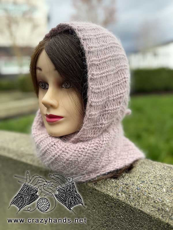 knit baktus scarf on a female mannequin's head - left side view
