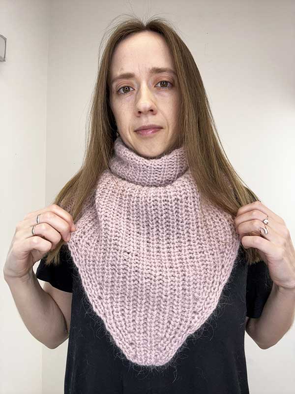 knit baktus scarf on a female model - front side view 2