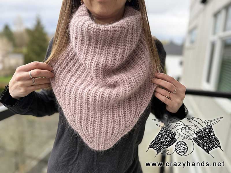 knit baktus scarf on a female model - front side view 1